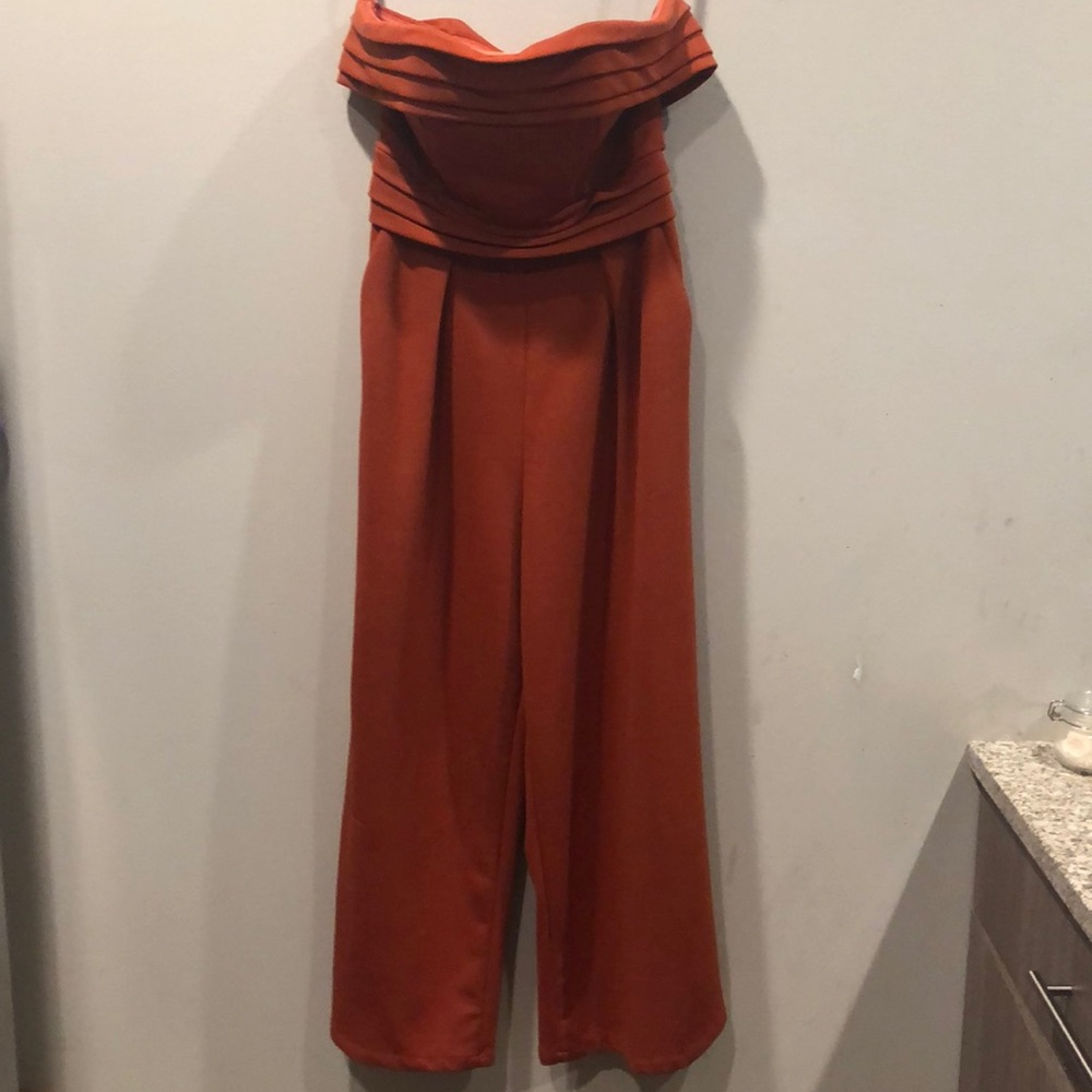 Burnt orange jumpsuit - size small